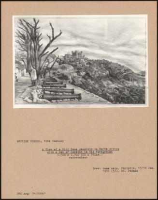 A View Of A Hill Town Possibly In North Africa With A Row Of Cannons In The Foreground
