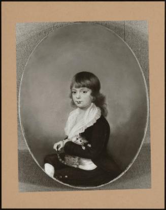 Portrait Of A Young Boy With A Kitten