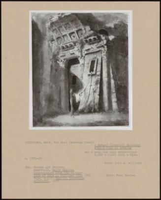 A Ruined Classical Building With A Line Of Washing